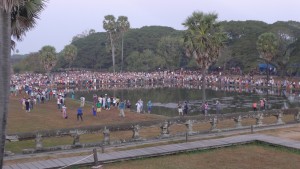 A sea of people at sunrise