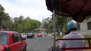 Our tuk tuk driver/guide, driver towards Wat Phnom