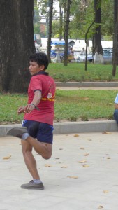 Playing Cambodian shuttlecock (great back & hip extension!)